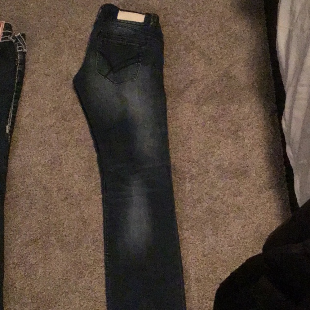 Rare William Rast Straight legged blue jeans.